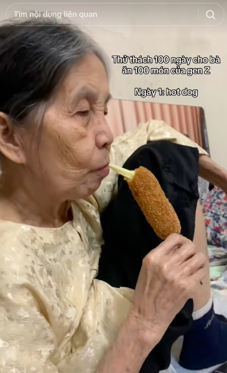 Hơn 6 triệu người dõi cụ bà "mukbang" pizza, trà sữa... qua camera của cháu gái- Ảnh 1. Hơn 6 triệu người dõi cụ bà "mukbang" pizza, trà sữa... qua camera của cháu gái- Ảnh 1.