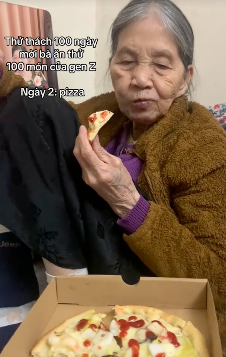 Hơn 6 triệu người dõi cụ bà "mukbang" pizza, trà sữa... qua camera của cháu gái- Ảnh 3. Hơn 6 triệu người dõi cụ bà "mukbang" pizza, trà sữa... qua camera của cháu gái- Ảnh 3.