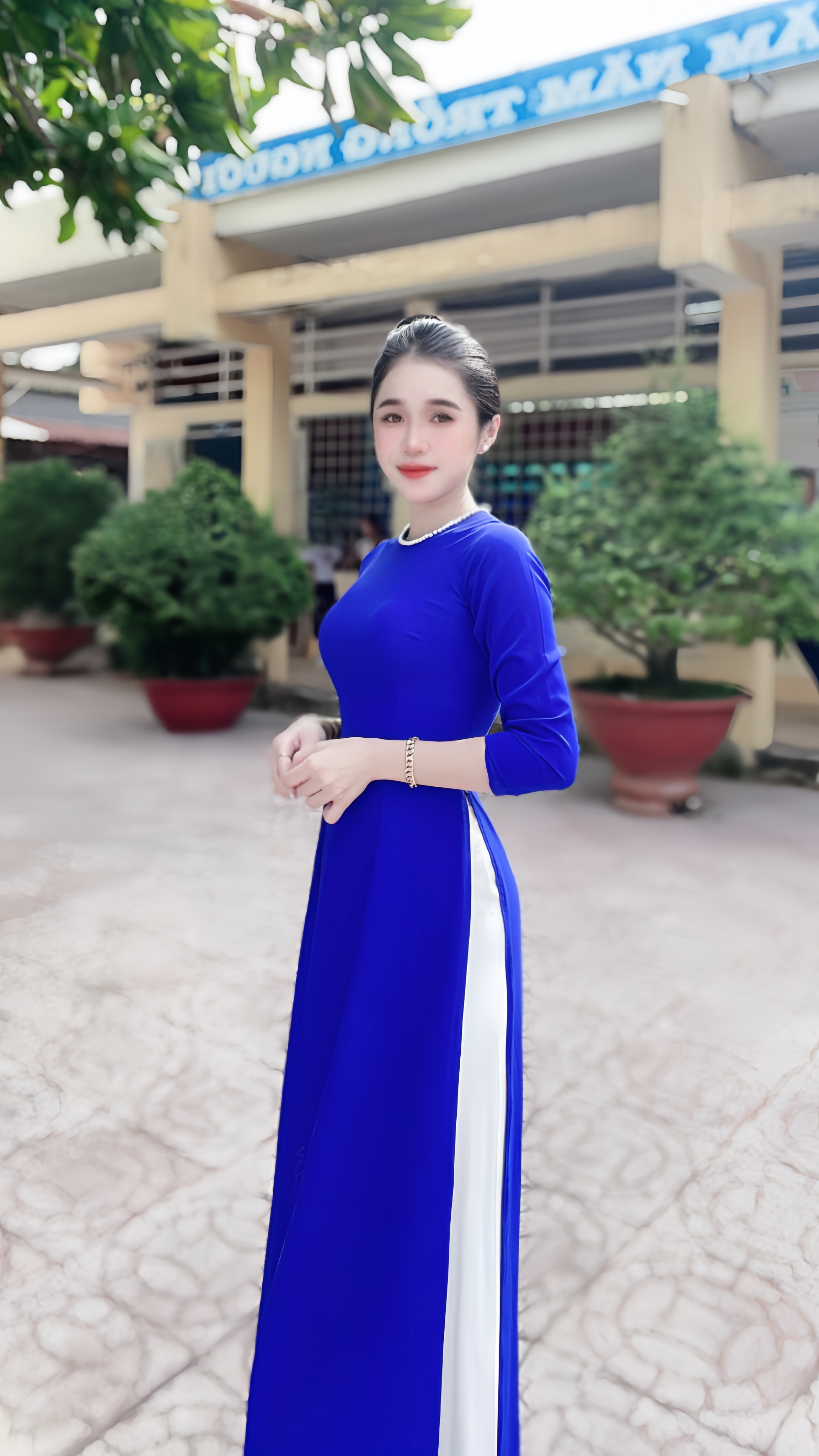 Cô giáo tiểu học đang hot TikTok: Mặt xinh - dáng đỉnh, BST áo dài đi dạy cả tuần không trùng màu là xịn nhất!- Ảnh 2.