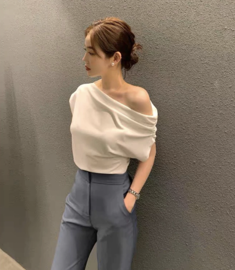 2 kiểu áo hot nhất hè này: Giá chưa đến 100k mà giúp vóc dáng thon thả hơn khi diện- Ảnh 3. 2 kiểu áo hot nhất hè này: Giá chưa đến 100k mà giúp vóc dáng thon thả hơn khi diện- Ảnh 3.