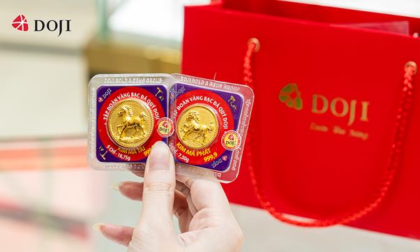 DOJI hút khách mua vàng bạc ngày Thần Tài - Ảnh 4.