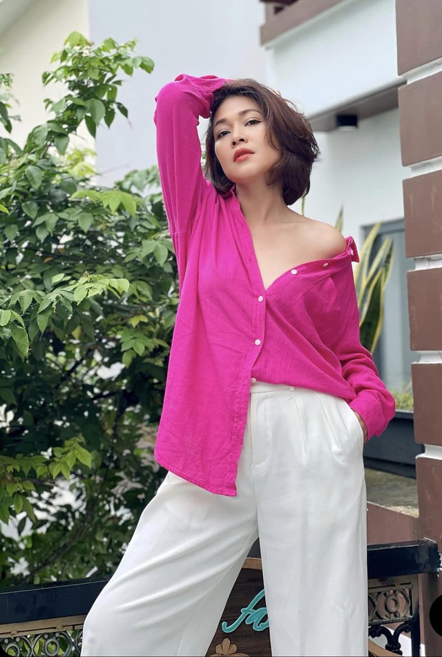 Nhan sắc trẻ trung của &quot;nữ hoàng cảnh nóng&quot; Đinh Y Nhung, tuổi 43 vẫn sở hữu body bốc lửa - Ảnh 8.