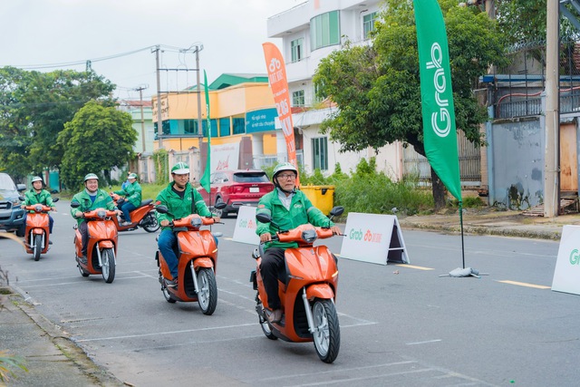 Grab Việt Nam và Dat Bike hợp tác hỗ trợ tài xế công nghệ chuyển đổi xanh- Ảnh 2. Grab Việt Nam và Dat Bike hợp tác hỗ trợ tài xế công nghệ chuyển đổi xanh- Ảnh 2.