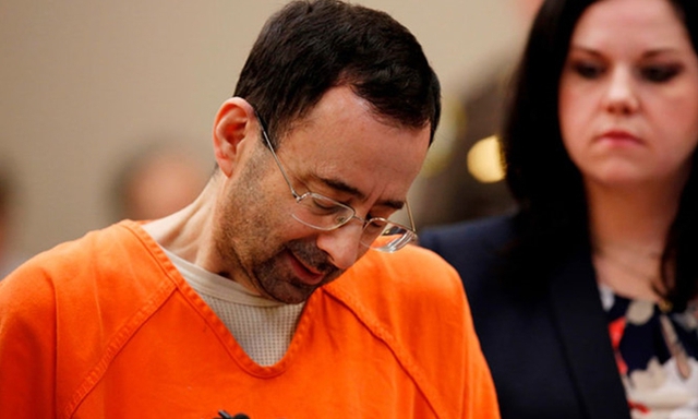 100 VĐV nữ bị tấn công tình dục, 37.000 ảnh khiêu dâm trẻ em,... giới thể thao choáng váng vì bác sĩ "yêu râu xanh"- Ảnh 1. 100 VĐV nữ bị tấn công tình dục, 37.000 ảnh khiêu dâm trẻ em,... giới thể thao choáng váng vì bác sĩ "yêu râu xanh"- Ảnh 1.