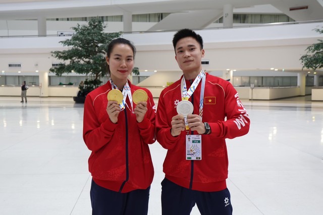 Nữ võ sĩ Việt Nam đời thường xinh đẹp ngất ngây, "lên sàn" tung cú đấm giành luôn 2 HCV SEA Games- Ảnh 6. Nữ võ sĩ Việt Nam đời thường xinh đẹp ngất ngây, "lên sàn" tung cú đấm giành luôn 2 HCV SEA Games- Ảnh 6.
