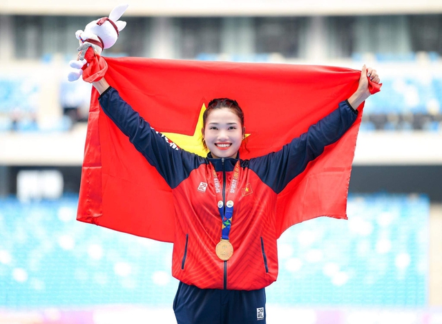 Nữ VĐV giành HCV SEA Games vinh dự rước đuốc tại Đại lễ 2/9: Là mẹ bỉm sữa visual vẫn sáng bừng- Ảnh 4. Nữ VĐV giành HCV SEA Games vinh dự rước đuốc tại Đại lễ 2/9: Là mẹ bỉm sữa visual vẫn sáng bừng- Ảnh 4.