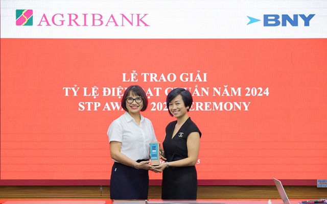 Agribank 16 năm liên tiếp nhận Giải thưởng Tỷ lệ điện đạt chuẩn từ The Bank of New York Mellon- Ảnh 1.