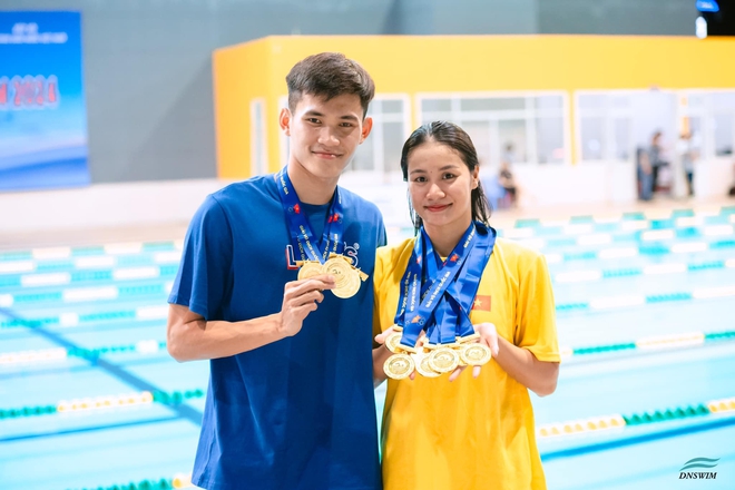Bức ảnh gây sốt của cặp đôi hot nhất SEA Games 33: Trai tài gái giỏi, đẹp đôi còn "lụm" cả "rổ" huy chương!- Ảnh 2. Bức ảnh gây sốt của cặp đôi hot nhất SEA Games 33: Trai tài gái giỏi, đẹp đôi còn "lụm" cả "rổ" huy chương!- Ảnh 2.