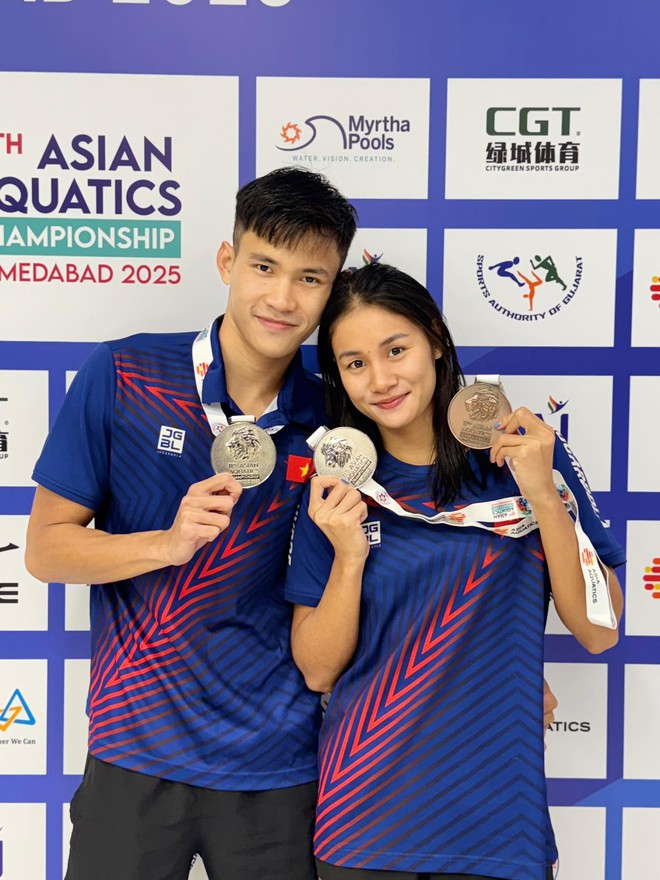 Bức ảnh gây sốt của cặp đôi hot nhất SEA Games 33: Trai tài gái giỏi, đẹp đôi còn "lụm" cả "rổ" huy chương!- Ảnh 4. Bức ảnh gây sốt của cặp đôi hot nhất SEA Games 33: Trai tài gái giỏi, đẹp đôi còn "lụm" cả "rổ" huy chương!- Ảnh 4.